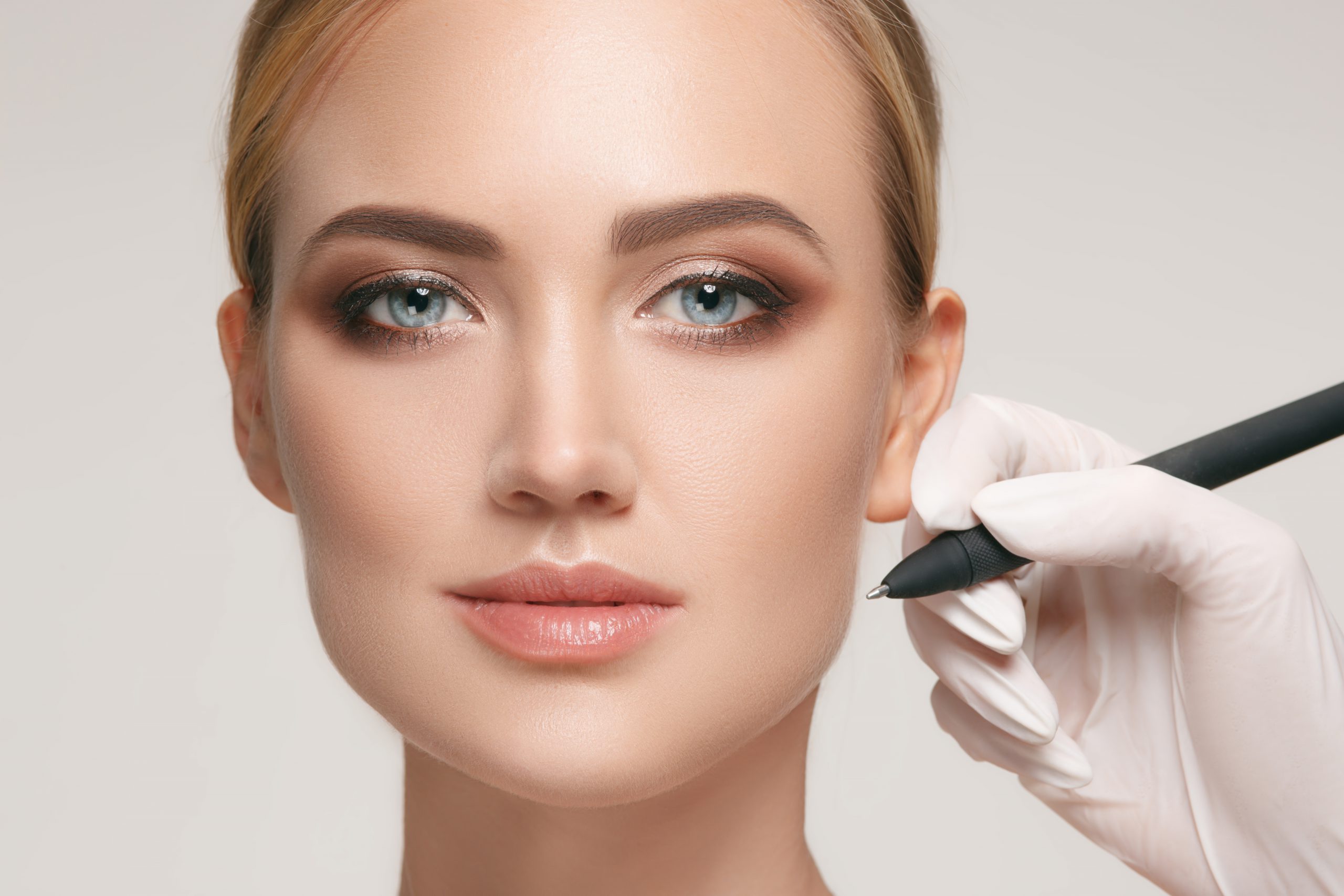 Beautiful young woman before plastic surgery operation.